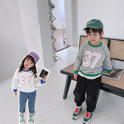 Children"s clothing wholesale autumn new children"s Round Neck Sweater Girl Baby 37 letter color matching Korean boys" sweater