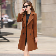 The vintage windbreaker pulls in the knee-length tweed coat